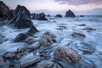 Dawn over the rugged coast of North Devon in winter, Devon
