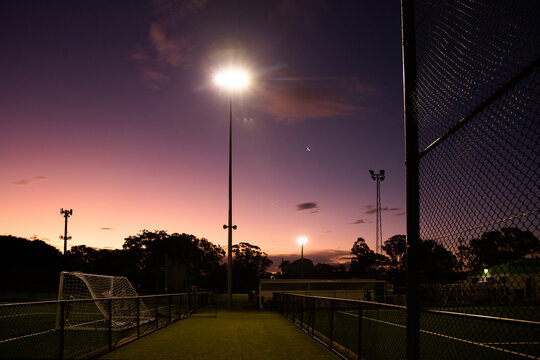 Fototapeta dusk at a local soccer club