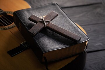 Holy Bible with retro acoustic guitar, music religion concept