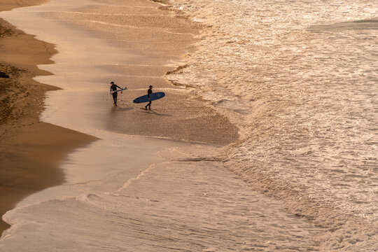 View of surfers on Playa del Viejo Reyes from Punta del Loco, La Pared, Fuerteventura
