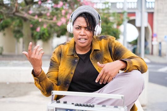 Young Woman Making Rhymes And Rapping Outdoors For Her Next Record. Concept: Music, Urbanstyle, Freestyle