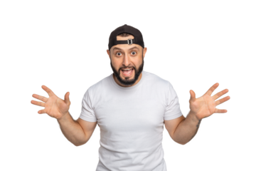 Portrait of young middle eastern bearded man with white t-shirt and the hat on backwards looking at camera. The man posing with his arms wide open. Studio shot, isolated on white background.