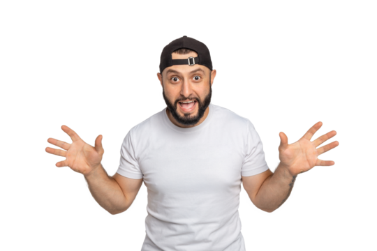 Portrait of young middle eastern bearded man with white t-shirt and the hat on backwards looking at camera. The man posing with his arms wide open. Studio shot, isolated on white background.