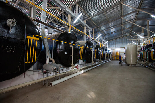 Jambyl province, Kazakhstan - April 24, 2012: Modern biogas plant. Gas tank reactors and furnaces.