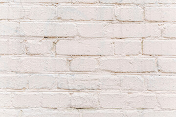The surface of a light old brick wall. Close-up. Space for text.