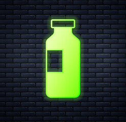 Glowing neon Bottle of water icon isolated on brick wall background. Soda aqua drink sign. Vector
