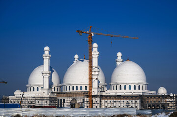 New white mosque under construction for the Muslim faith in Kazakhstan in Shymkent