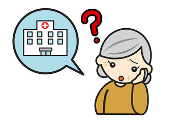 病院について考えるシニア女性