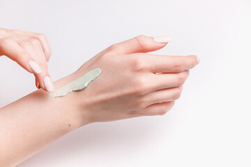 Beautiful Woman Hands Applying Green Clay Cosmetics Cream Mask