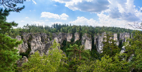 Prachov rocks (Prachovske skaly) in Cesky Raj region, Czech Republic. Sandstone rock formation in vibrant forest.