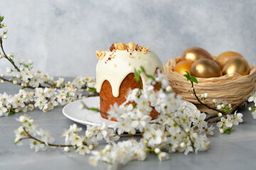 Traditional Easter cake with nuts on gray background