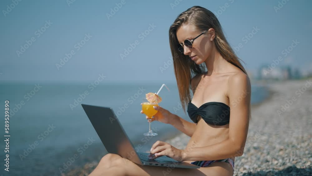 Poster a female freelancer is working on laptop near sea. programmer is coding and surfing on notebook. rem