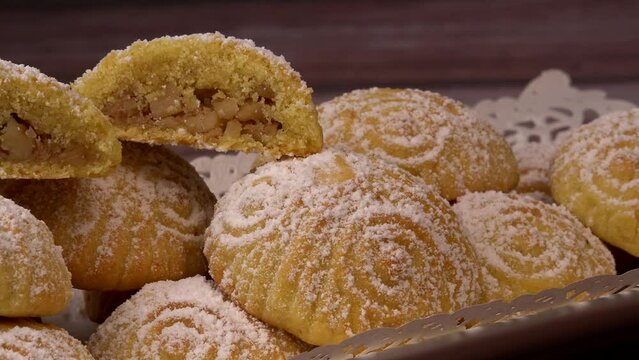 Traditional eid maamoul or mamoul cookies with dates, nuts, and jam, Arabic sweets for Aid al-Fitr and easter, High quality video