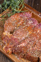 Pork meat pieces marinated with spices and salt