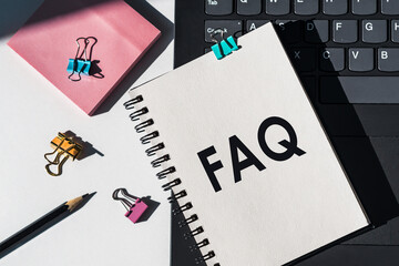 FAQ Text - Frequently Asked Questions - text on white paper on keyboard - obrazy, fototapety, plakaty