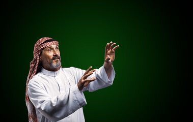 Arab healer performs energy work using hands, channeling spiritual forces for holistic well-being...