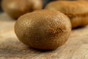 Whole ripe kiwi on the table
