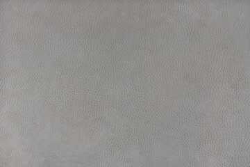 Texture background of gray velours fabric textured like leather surface. Fabric texture close up of...