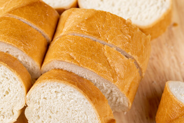 Sliced soft French baguette made of wheat flour