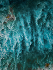 View from above, stunning aerial view of a Of a beautiful blue sea that forms a natural background.