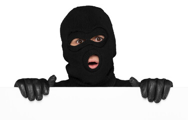 Thief hiding behind an empty white sign with space for text isolated on white background