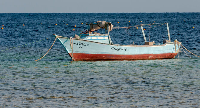 MARS ALAMA, EGYPT - MARCH 03, 2019: Fishing boat on the background of the Red Sea, Egypt