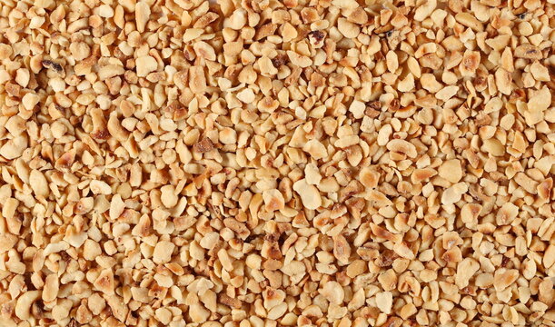 Pile chopped and roasted hazelnut background and texture