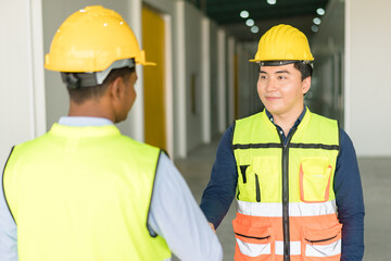 Construction team shake hands greeting start new project plan