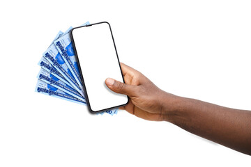 Black hand holding mobile phone with blank screen and Nigerian naira notes