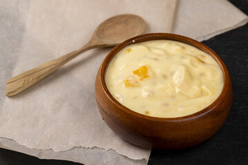 natural yogurt with pieces of fruit and banana flavor