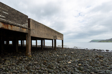 Under the harbour building at Carnlough on the Antrim Coast, Northern Ireland