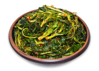 Canola(oilseed rape) Kimchi in an earthen bowl on a white background with clipping path. Korean food.