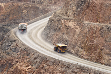 two dump trucks on the way in to the super pit, aerial view, Kalgoorlie, Boulder, Goldfields,...
