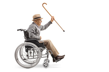 Elderly man sitting in a wheelchair and holding a cane