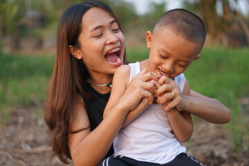 Mother and child playing happily