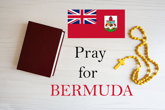 Pray for Bermuda. Rosary and Holy Bible background.