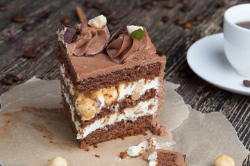 Sweet cake with chocolate cakes and salted caramel with nuts