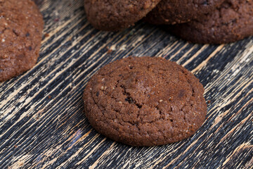 chocolate cookies on a wooden board