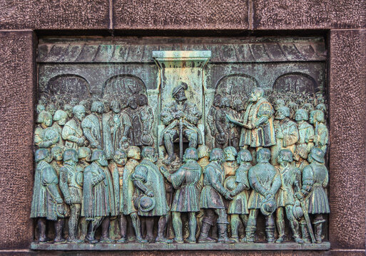 Copenhagen, Denmark - September 13, 2010:  Christian III Confirmed The Reformation Of Denmark Green Bronze Relief On Front Reformation Memorial Obelisk At Bispetorv Square