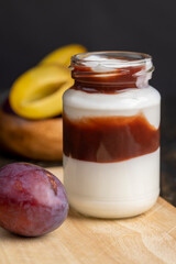 Ripe plums cut into pieces during cooking