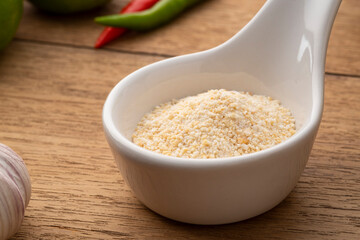 Obraz na płótnie Canvas Close up ground roasted rice,brown rice powder (khaokua) in white bowl