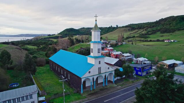 Traditional wood church in Ril&aacute;n, Chilo&eacute;, Chile. UNESCO World Heritage Sites. Shot by drone