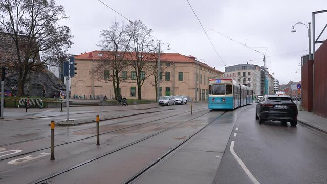 Classical tram on a street of Gothenburg in Sweden. Rainy day in Gothenburg.