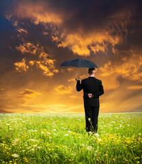 The person with an umbrella