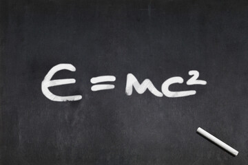 E=mc2 written on a blackboard