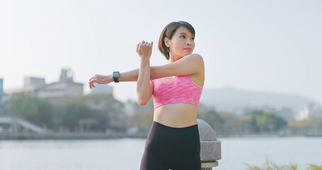 female doing warm up exercise