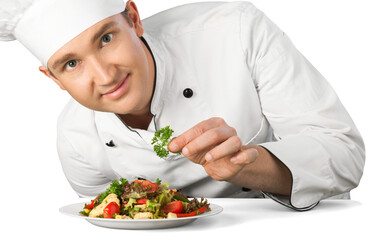 Portrait of a male chef cook preparing salad  isolated on a white background