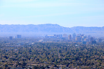 Obraz premium Aerial view of Arizona capital City of Phoenix covered in foggy mist in the morning