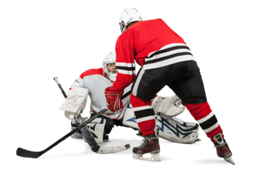 Male ice hockey players in helmets holding hockey sticks and playing on a white background