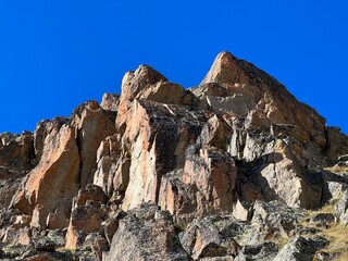 Rocks and stones in the autumn Alpine environment of the Albula Alps and above the Swiss mountain road pass Fluela (Flüelapass), Zernez - Canton of Grisons, Switzerland (Schweiz)